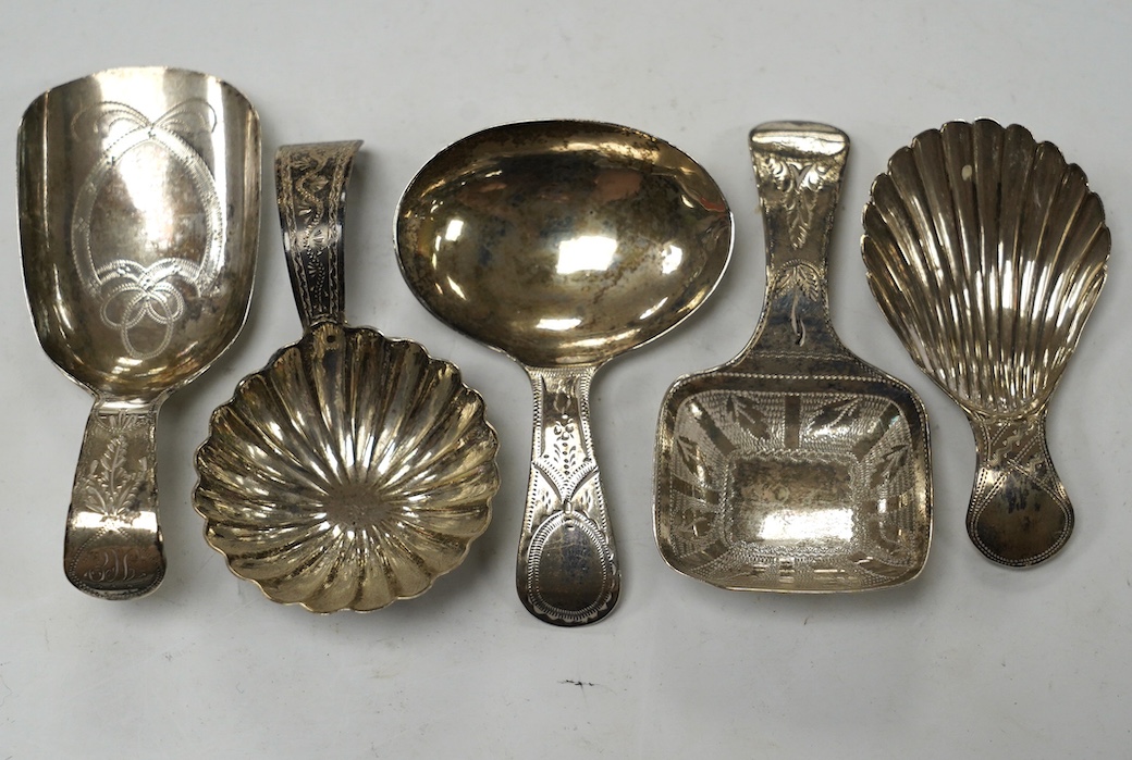 Five assorted silver caddy spoons, including shovel shape by Cocks & Bettridge, Birmingham, 1808, 71mm, oval bowl, John Blake, London, 1804, square bow, Joseph Wilmore, Birmingham, 1810, shell bowl, Joseph Taylor, Birmin